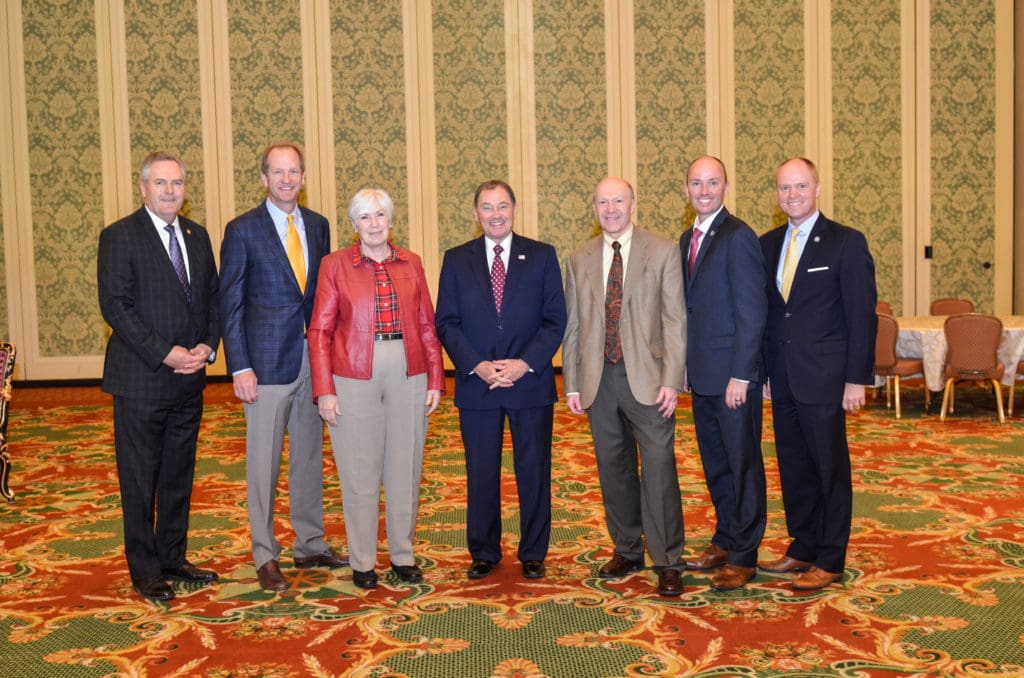 Gail Miller with CEO Clark Whitworth, Governor Gary Herbert, and other event attendees.