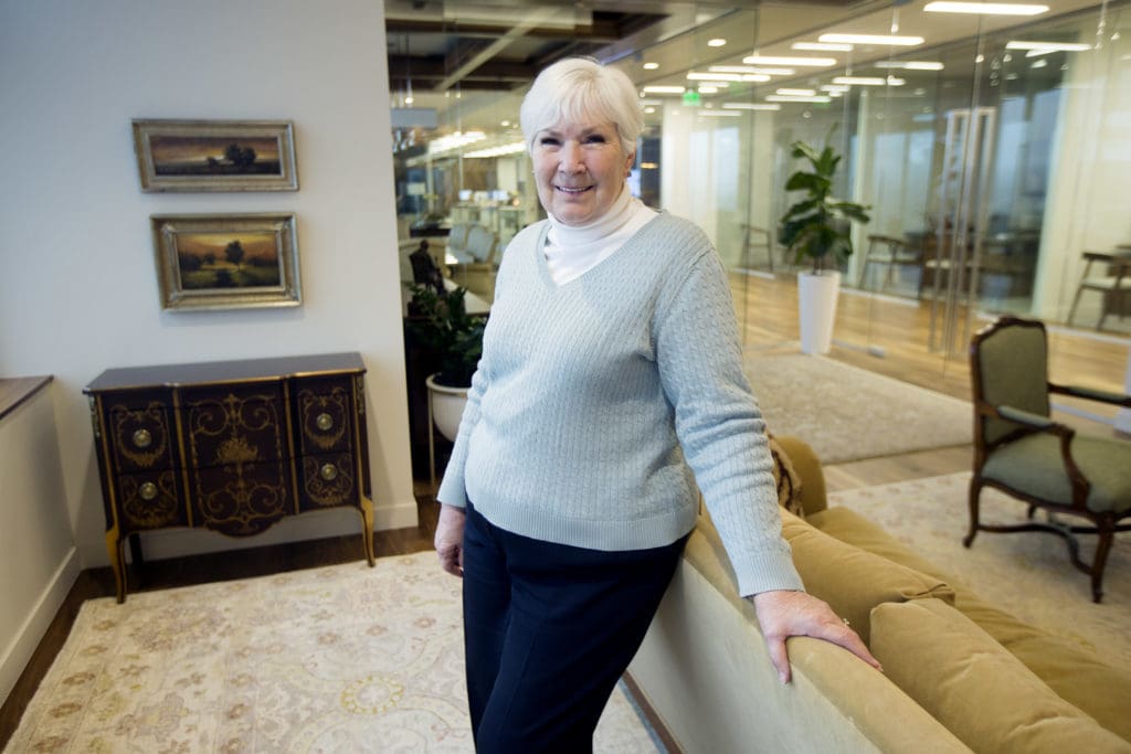 Gail Miller standin in her office