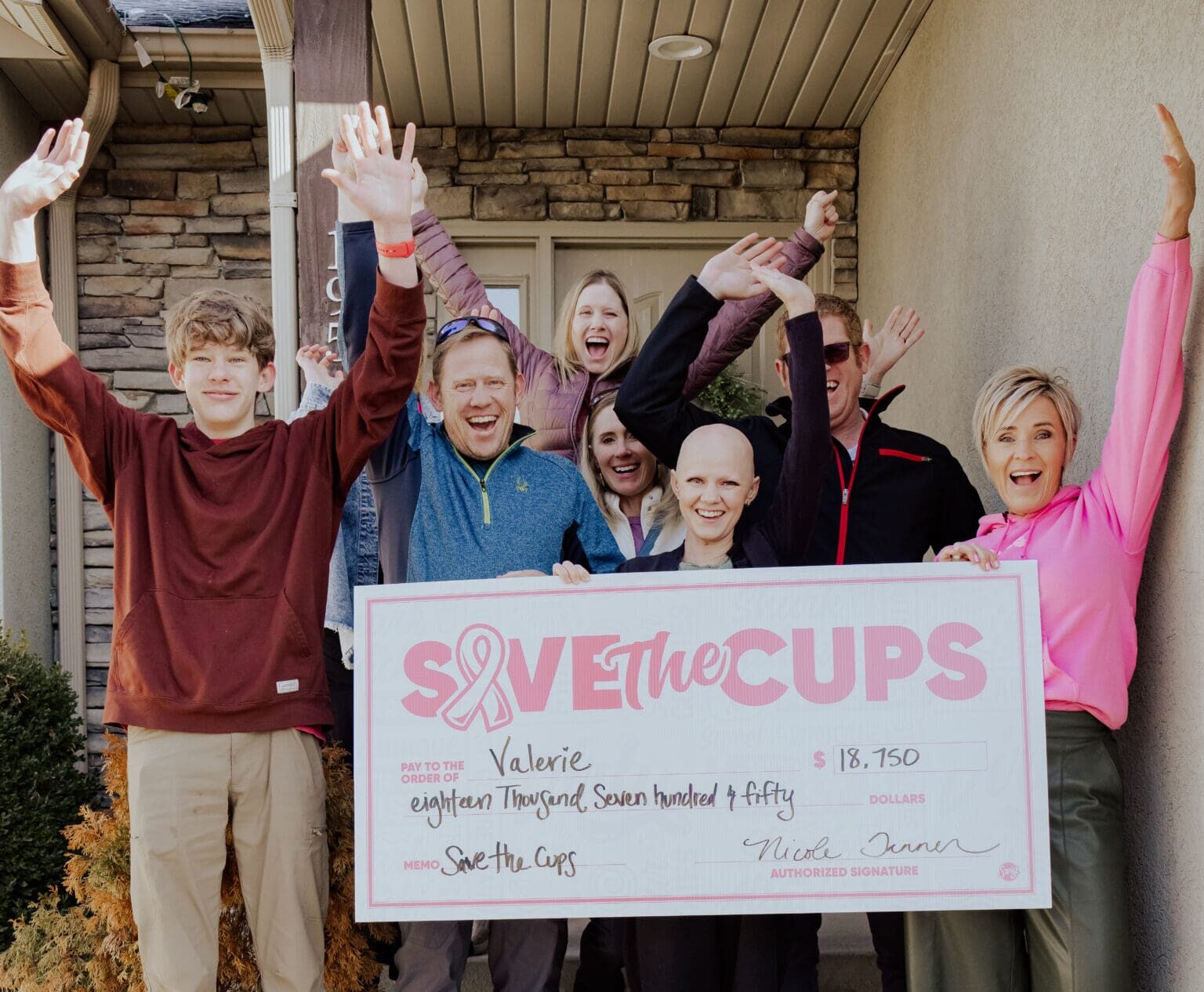 Swig founder Nicole Tanner with a Save the Cups recipient.